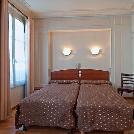Hotel Saint Quentin Παρίσι Δωμάτιο φωτογραφία