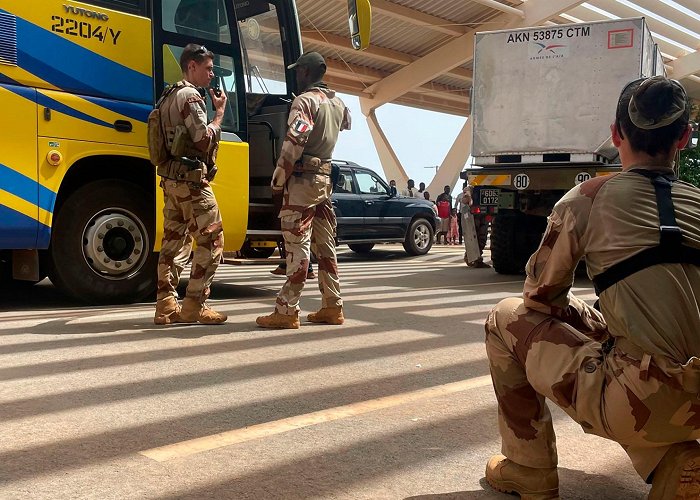French Embassy European militaries evacuate foreign nationals from Niger as ... photo