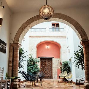 Frenteabastos Suites Cafe Hostal & Apartments Καρμόνα Exterior photo