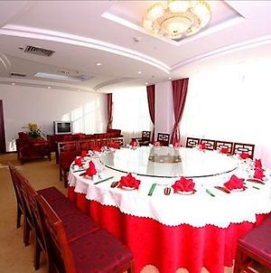 Li Xiang Yuan Resort Hotel Λιγιάνγκ Restaurant photo