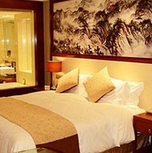 Junhui International Hotel Qiqihar Room photo